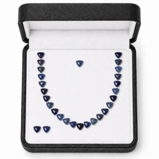 NATURAL MILKY BLUE SAPPHIRE —  21.50CT - AA QUALITY - MOZAMBIQUE — Trillion Cut Wholesale Lot